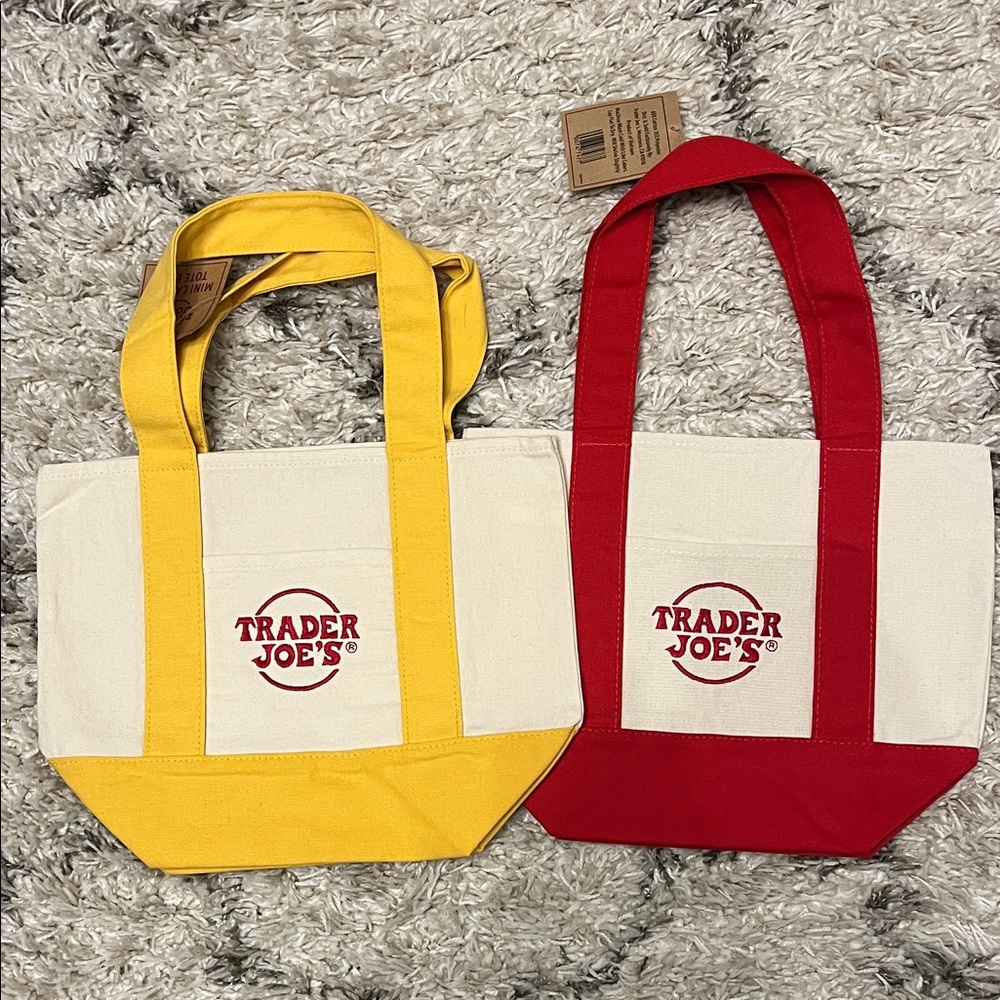 Trader Joe’s mini canvas tote bags. Set of two. Red. Yellow. New.